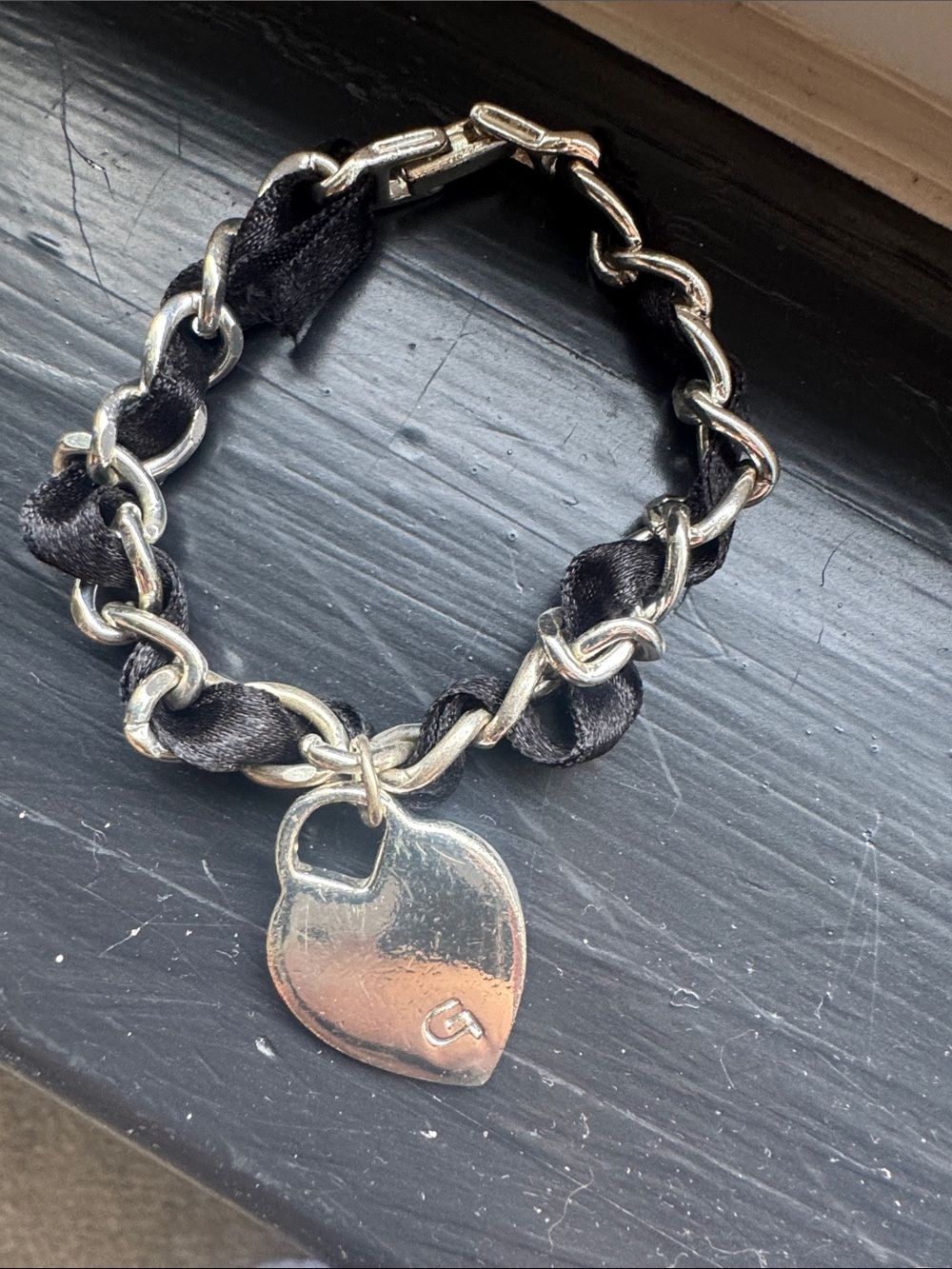 G by Guess Black and Silver Heart Charm Bracelet